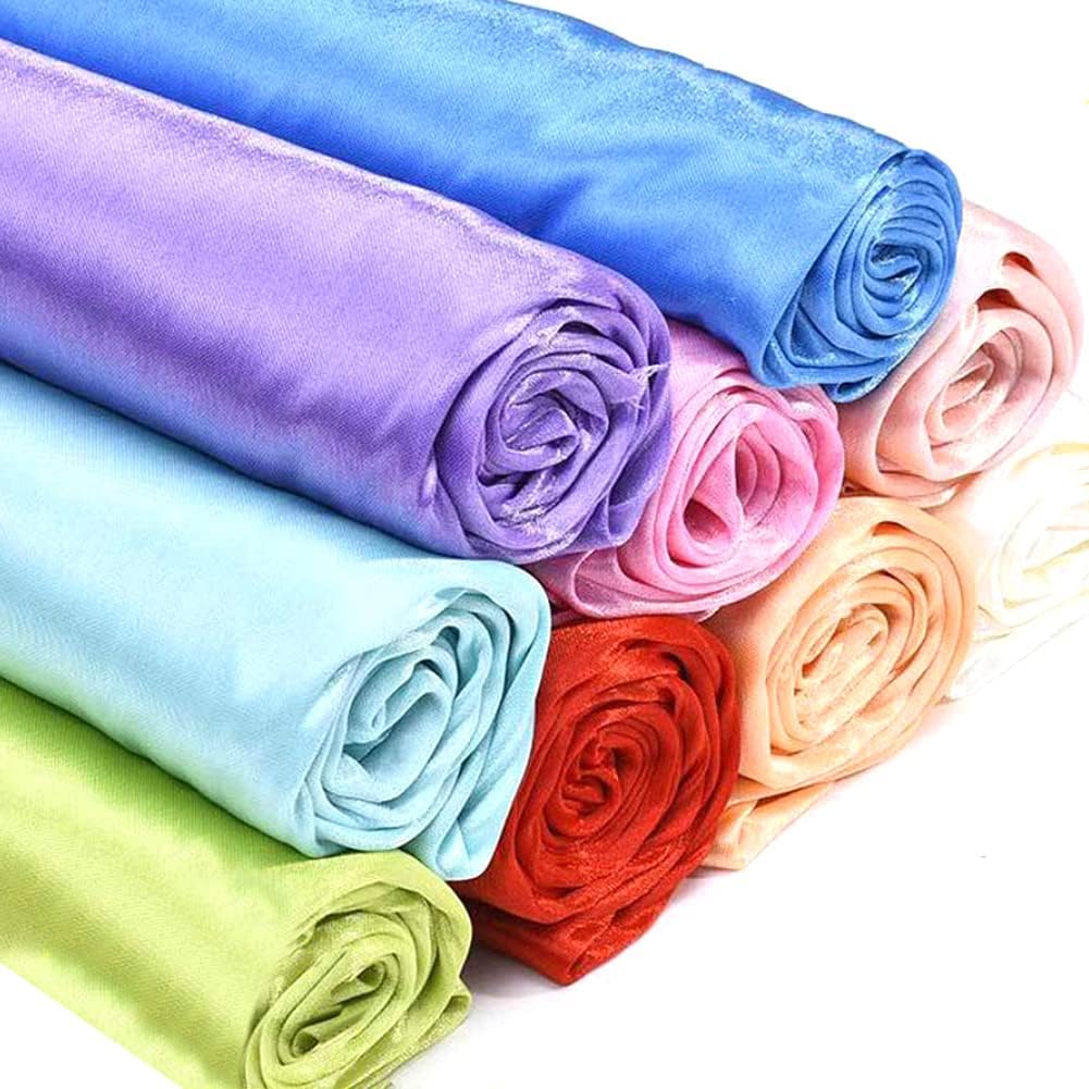 A roll of satin cloth made from fabric, showcasing its smooth texture and vibrant color. The fabric is neatly rolled up, emphasizing its lightweight and versatile nature.