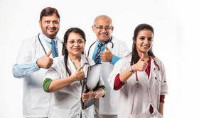 Display of doctor uniforms made from various fabrics, including cotton and polyester, arranged on hangers in a medical apparel store.