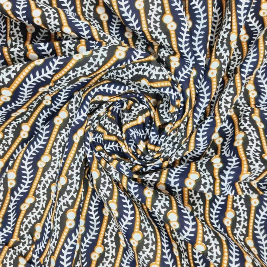 High-quality muslin fabric featuring a geometric print in soft pastel colors, ideal for crafting, quilting, and home décor projects.